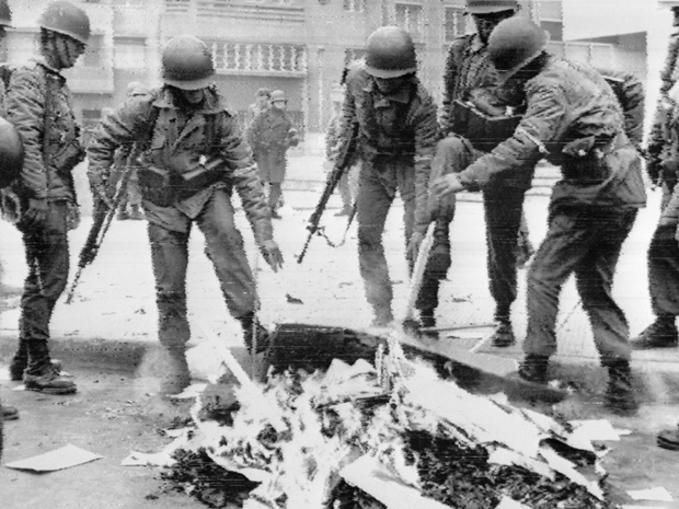 Chilean soldiers burning Marxist books in the capital city during the military coup, Santiago, 26 September 1973. Presidente Salvador Allende died in the Presidential Palace on the 11 September 1973 and Augusto pinochet, a career army officer, established himself at the head of the ensuing military regime.
